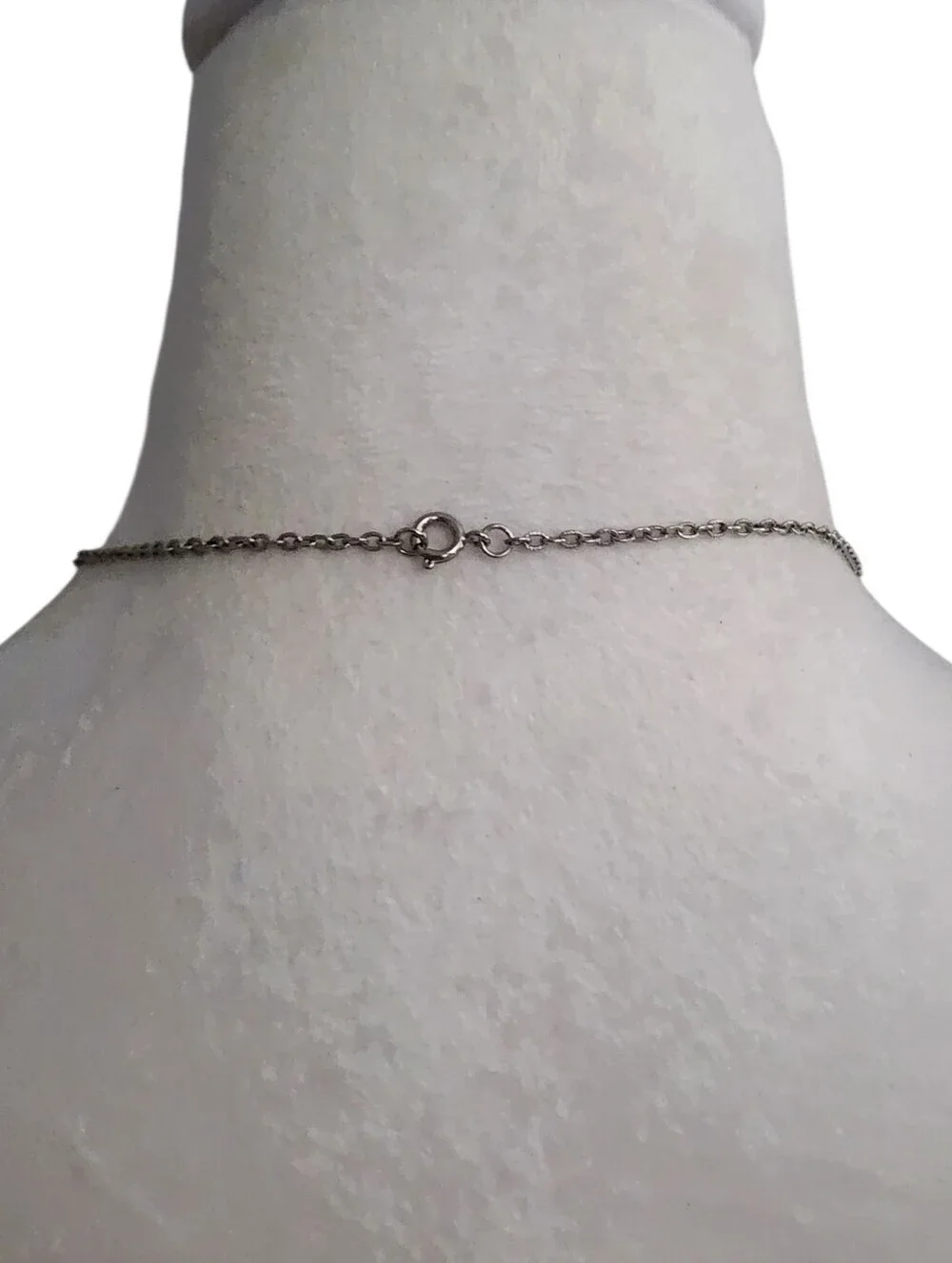 Nail Cross Pendant on a Silvertone Chain